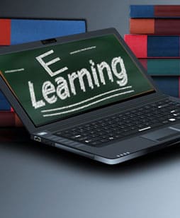 A laptop displaying e-learning to signify e-learning voice over services provided by Neil Williams English Male Voice Over Artist